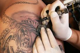 tattoo-artist-working